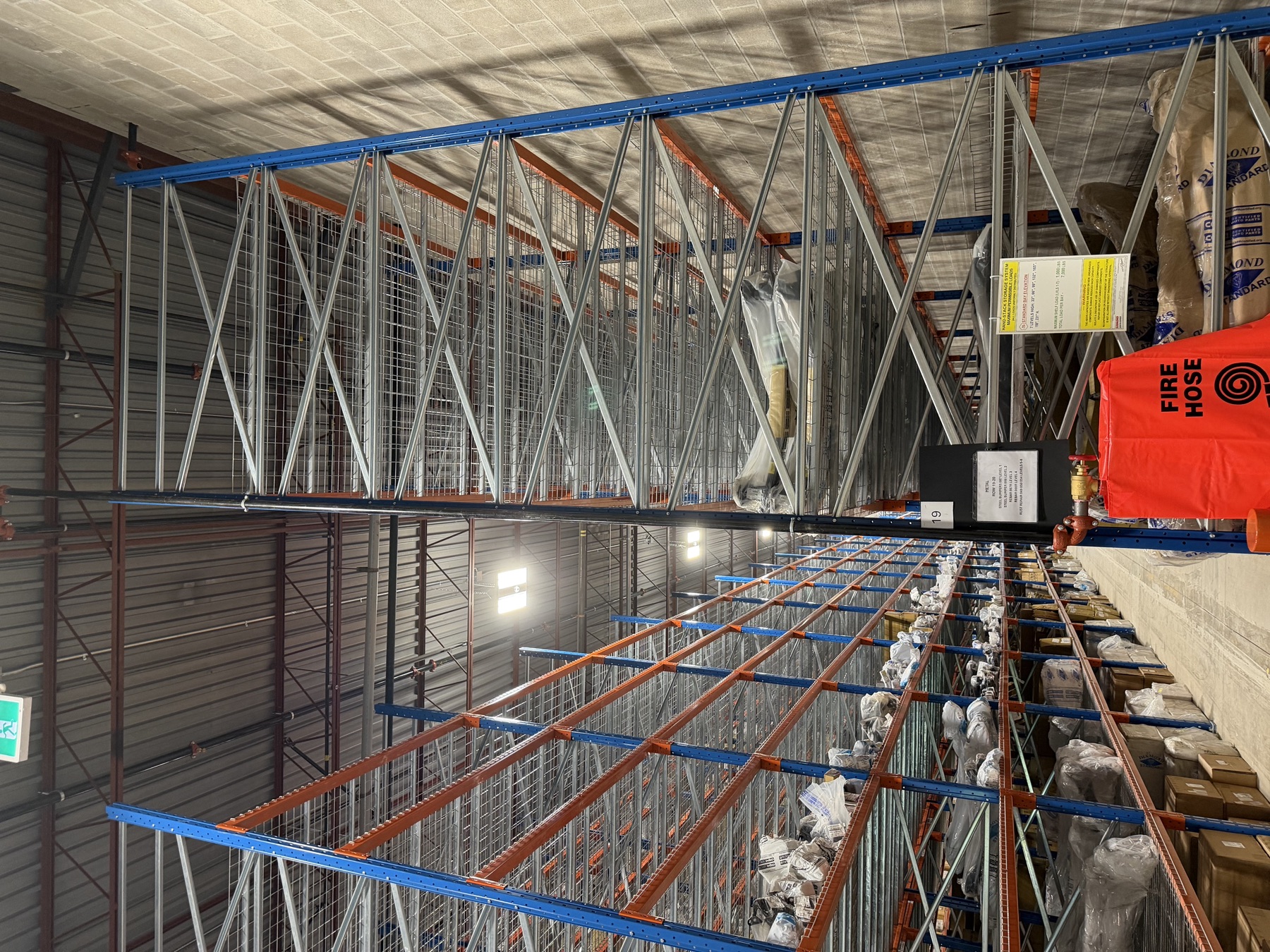 In-rack ESFR sprinkler heads through high-bay storage racking, APT Auto Parts