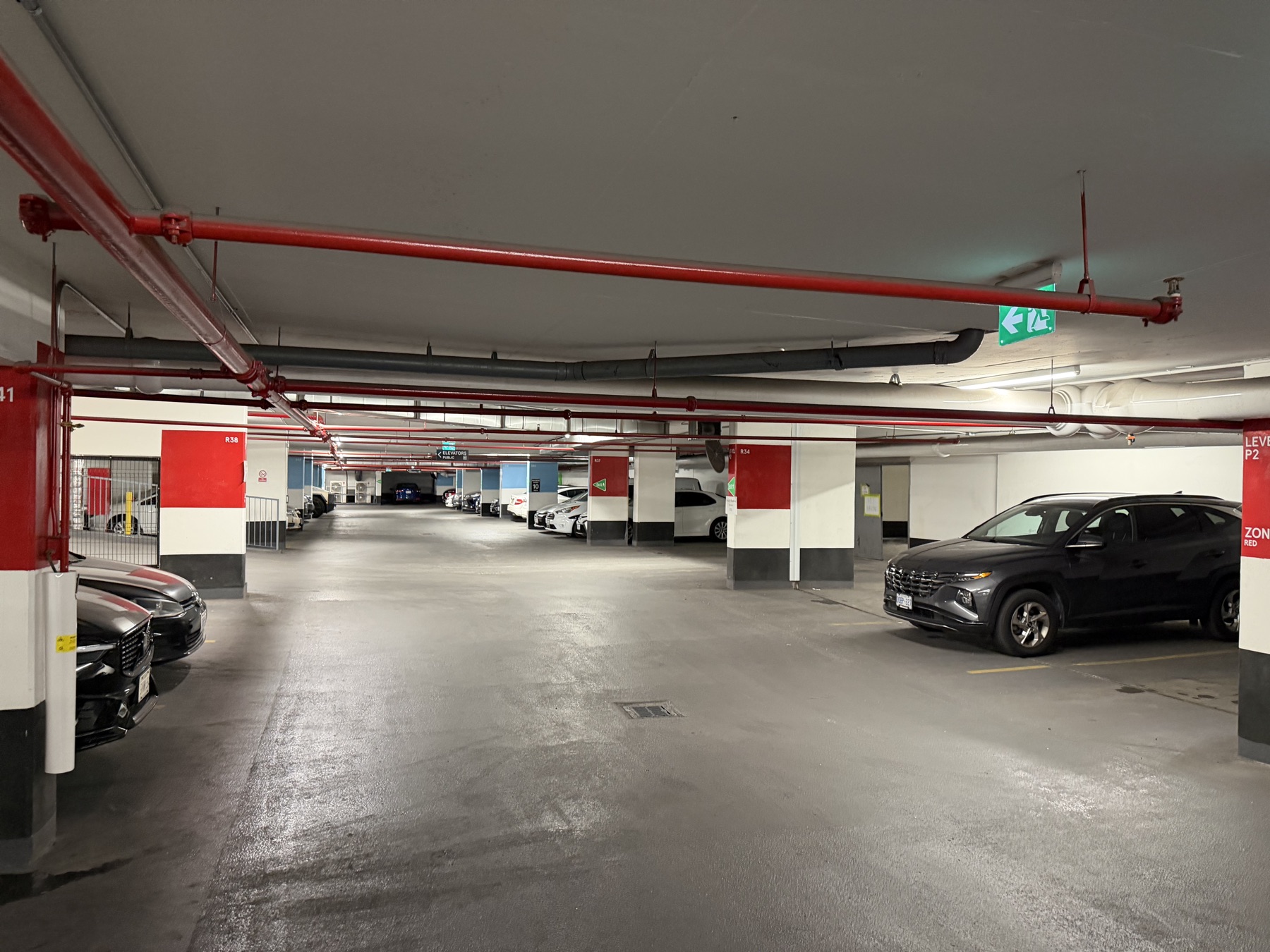Standpipe and sprinkler mains in parking garage, Exchange District Condominiums